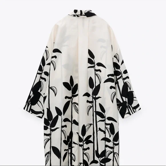 ๐ก๐ช๐ง ๐ญ๐ฎ๐ฟ๐ฎ โข Printed Oversized Dress - Picture 15 of 17